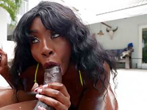 Amari Anne is sucking two black monster cocks poolside